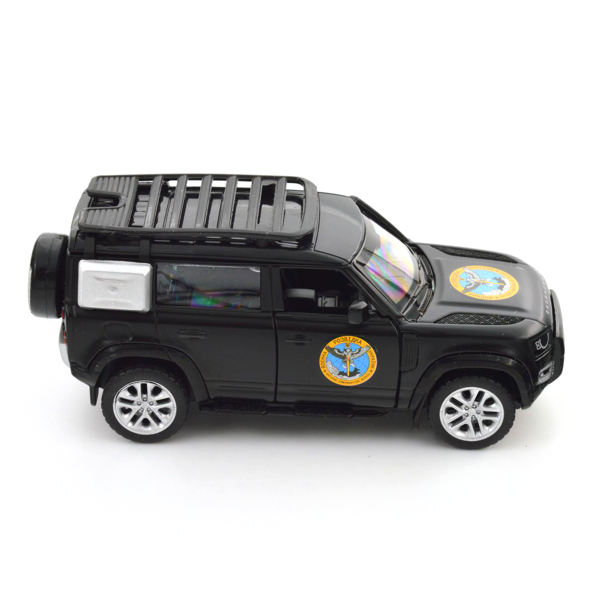Колекційна автомодель TechnoDrive Land Rover Defender 110 ГУР МО Шеврони Героїв 1:43 — превʼю 29